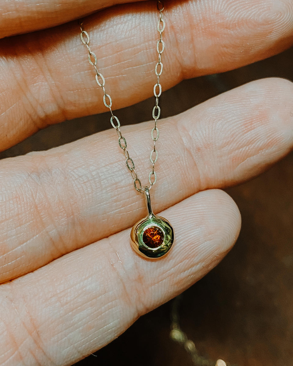 Garnet and hot sale gold necklace